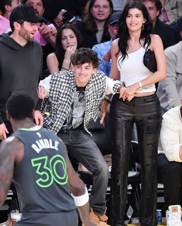 #KylieJenner and #TimothΓ©eChalamet are locking lips! π@kyliejenner @tchalamet On Wednesday, April 30, the couple was snapped sharing a kiss as they sat courtside during a date night at the Los Angeles...