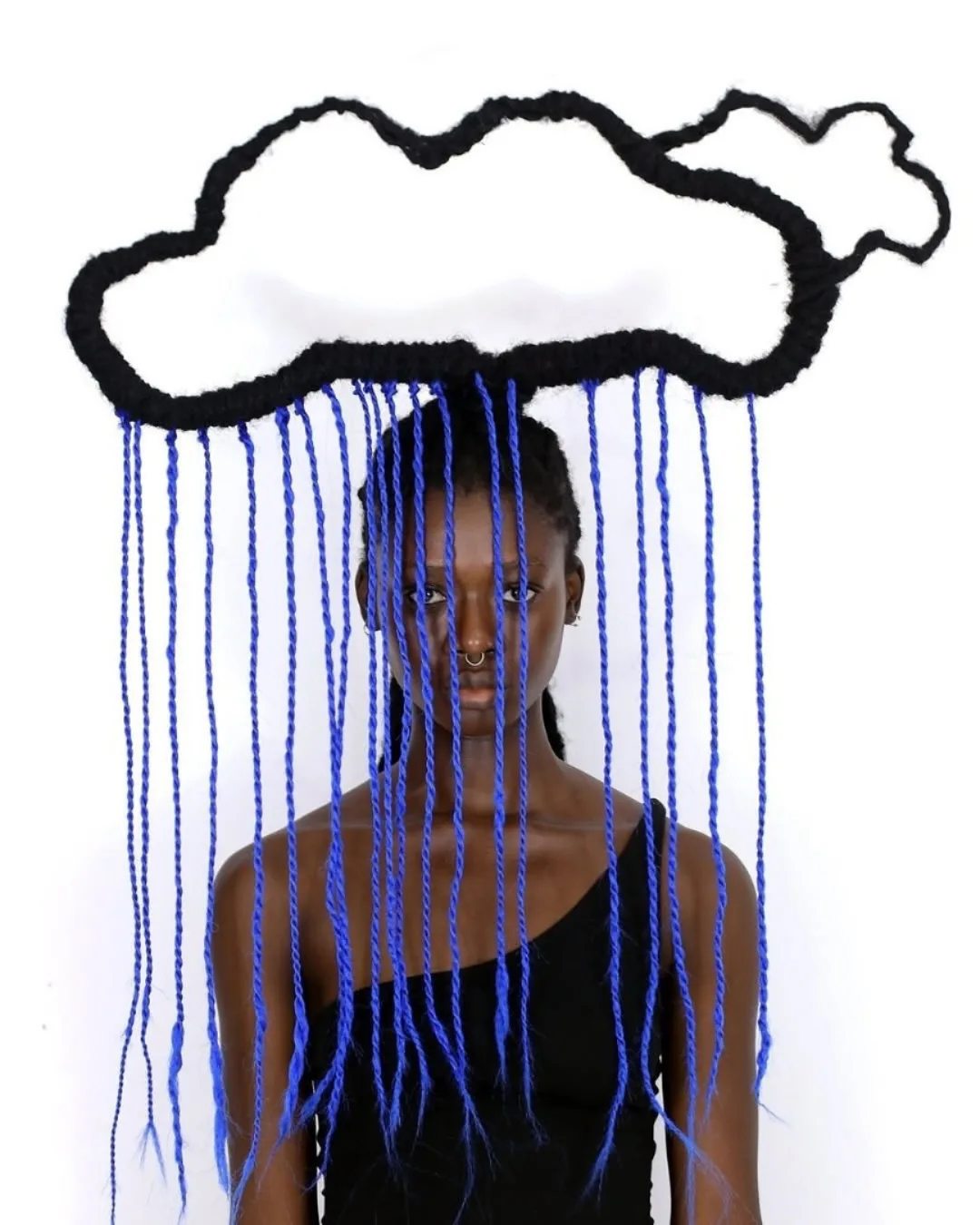 Laetitia Ky, a feminist artist from Ivory Coast, creates stunning art using her own hair. With wire and thread, she sculpts it into detailed, sketch-like designs.Inspired by traditional African hairst...