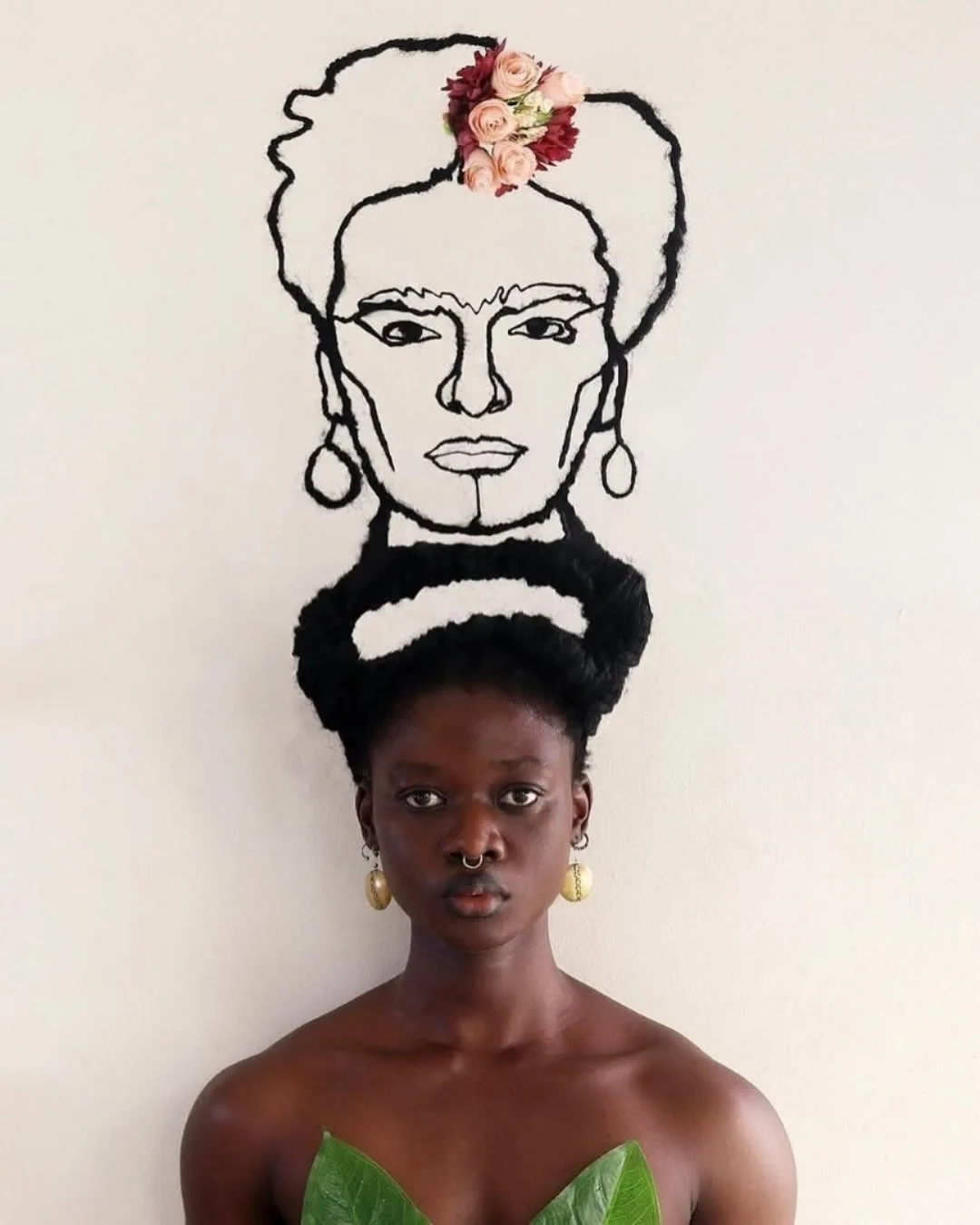 Laetitia Ky, a feminist artist from Ivory Coast, creates stunning art using her own hair. With wire and thread, she sculpts it into detailed, sketch-like designs.Inspired by traditional African hairst...